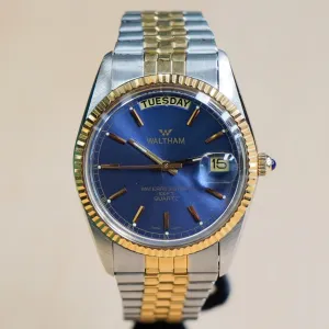 WALTHAM Day/Date Watch Waterresistant 100FT Quartz Wristwatch Blue Dial Two-Tone Case & Flex Band